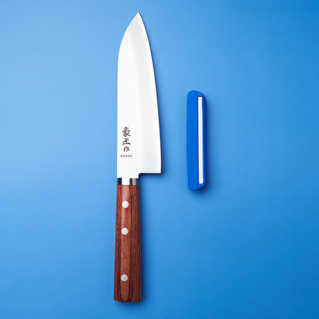 Chef's knife with wooden handle and Goshin branding on a blue background