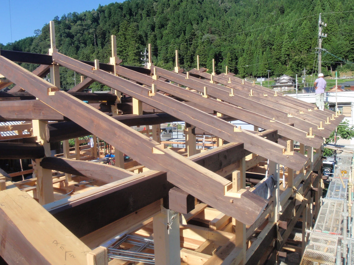 A traditional Japanese timber frame under construction